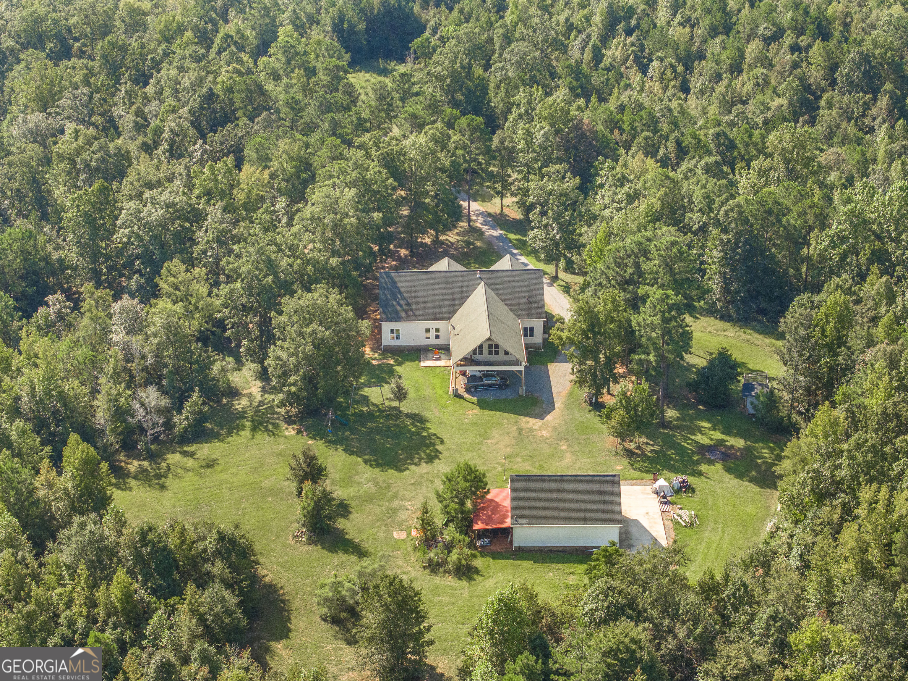 1979 Dent Road Musella, GA 31066 - Photo 59 of 77 an aerial view of a house with a yard