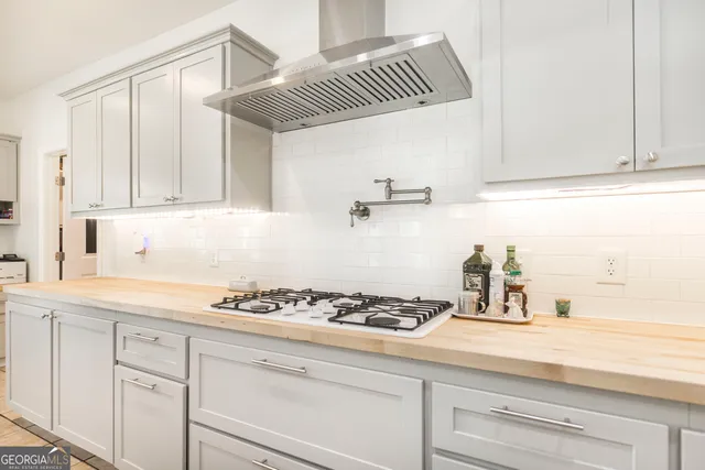 a room with furniture and a book shelf