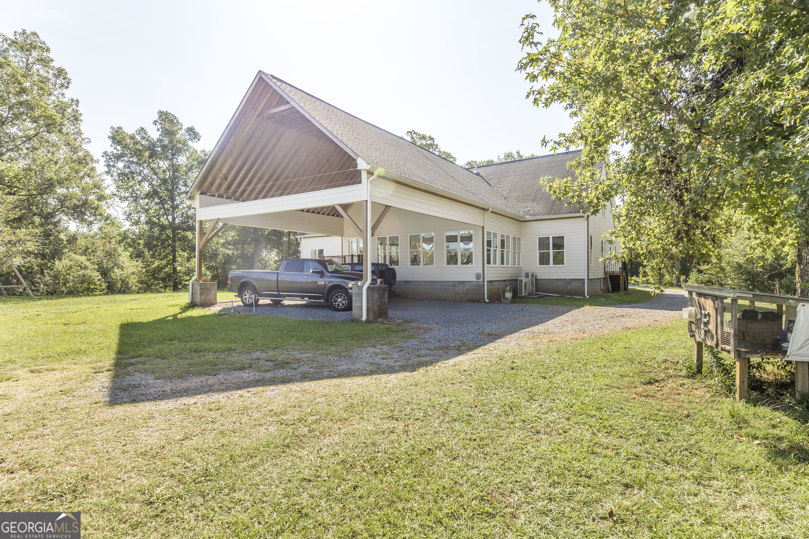 1979 Dent Road Musella, GA 31066 - Photo 68 of 77 a view of a house with backyard and sitting area