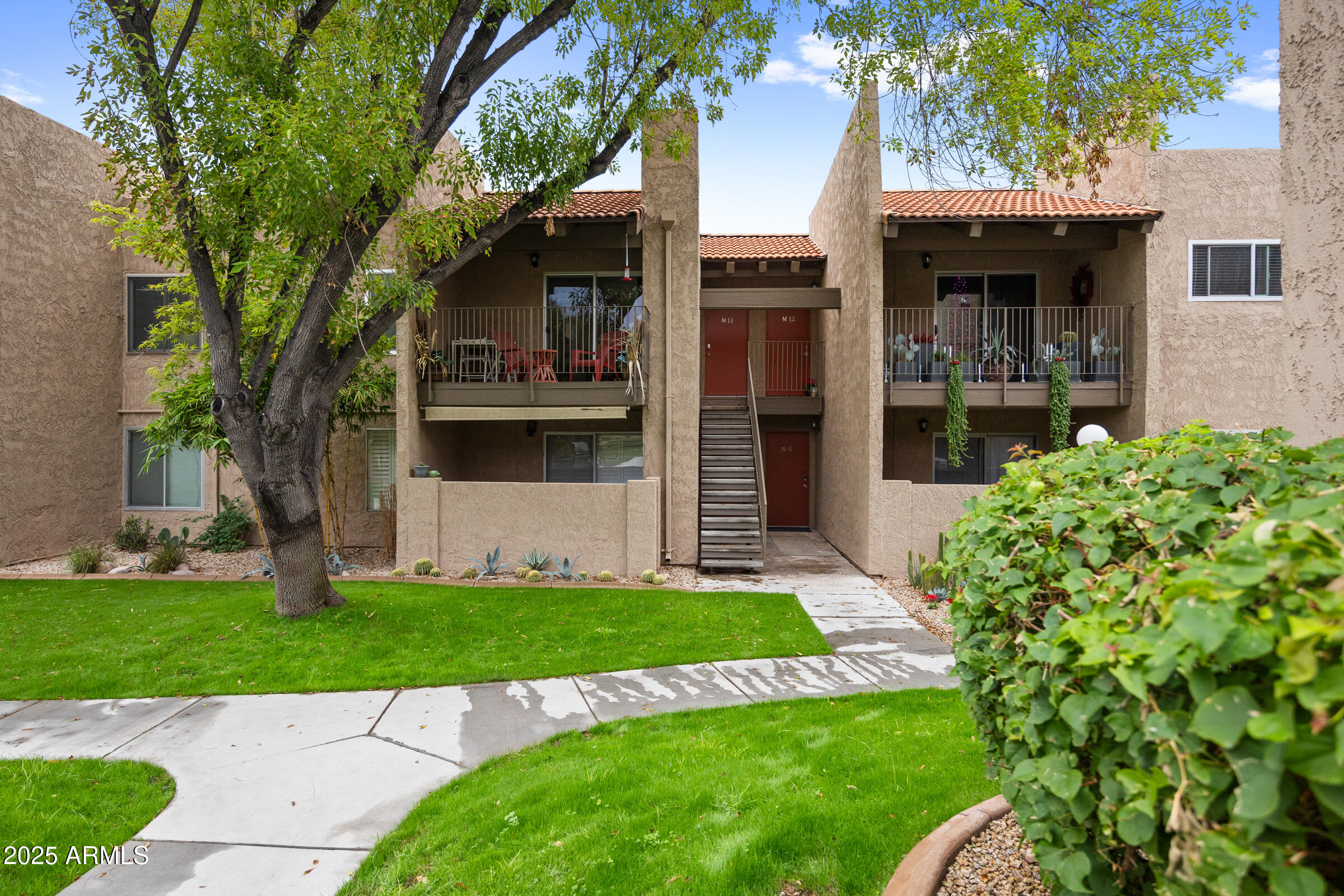5525 East Thomas Road, Unit M11 Phoenix, AZ 85018 - Photo 1 of 39 front view of a house with a yard