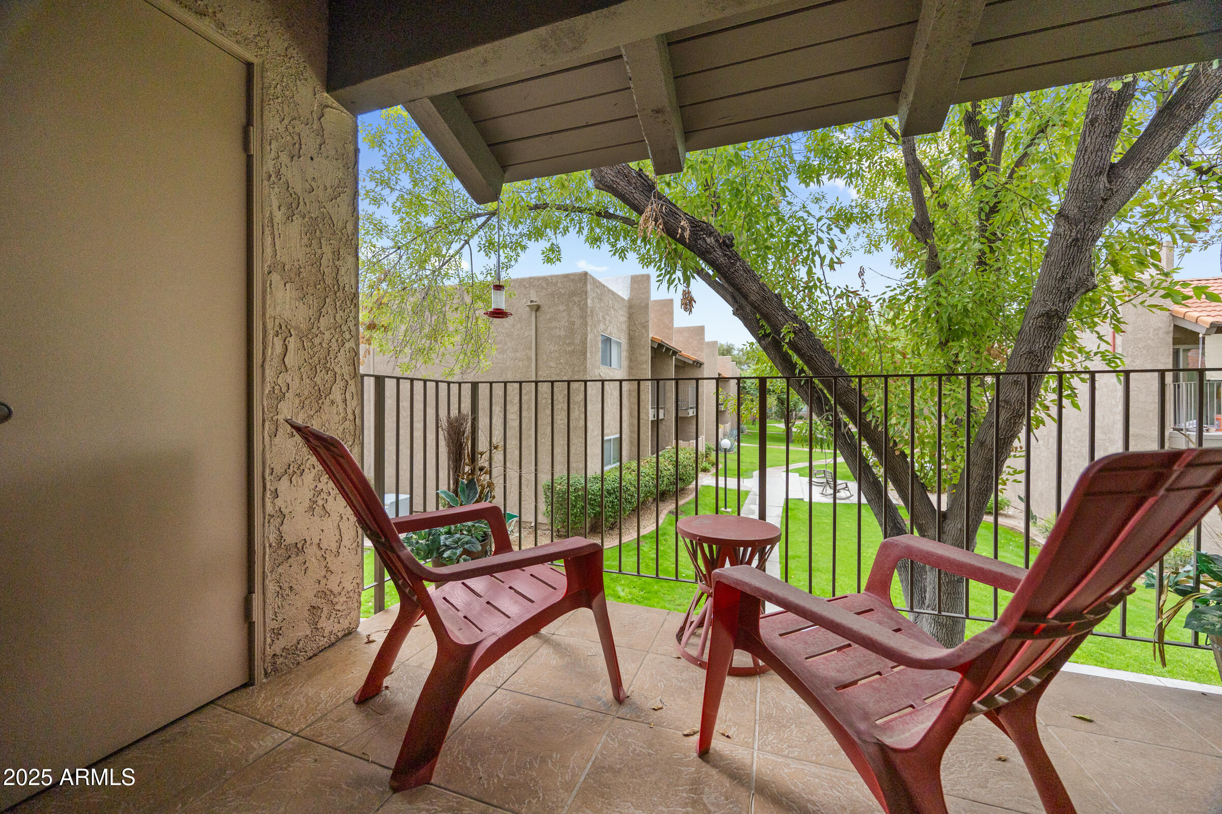 5525 East Thomas Road, Unit M11 Phoenix, AZ 85018 - Photo 21 of 39 a view of a chairs in balcony