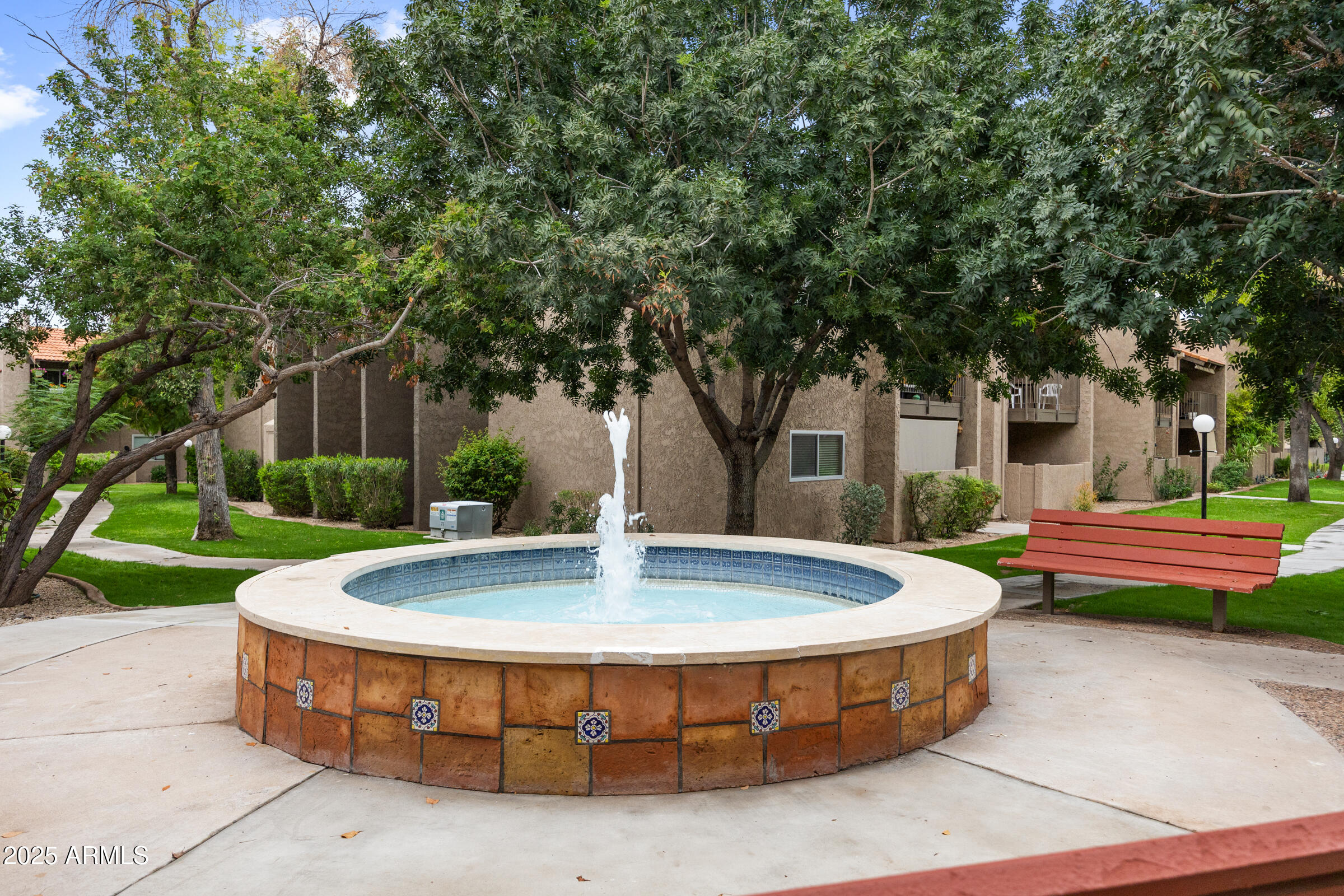 5525 East Thomas Road, Unit M11 Phoenix, AZ 85018 - Photo 22 of 39 a view of outdoor space yard swimming pool and sitting area