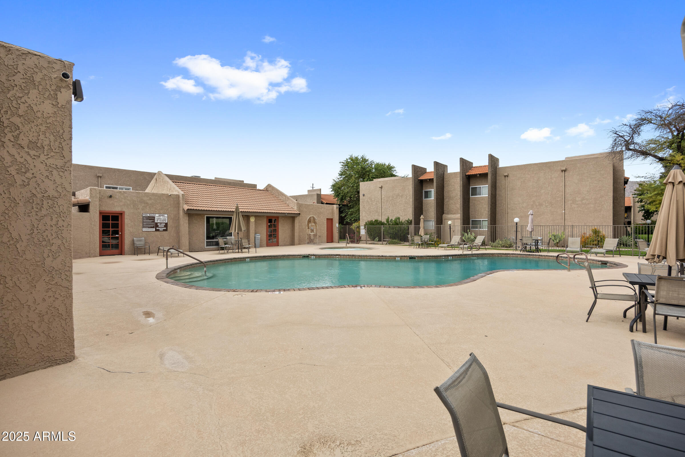 5525 East Thomas Road, Unit M11 Phoenix, AZ 85018 - Photo 26 of 39 a view of a house with a yard and sitting area