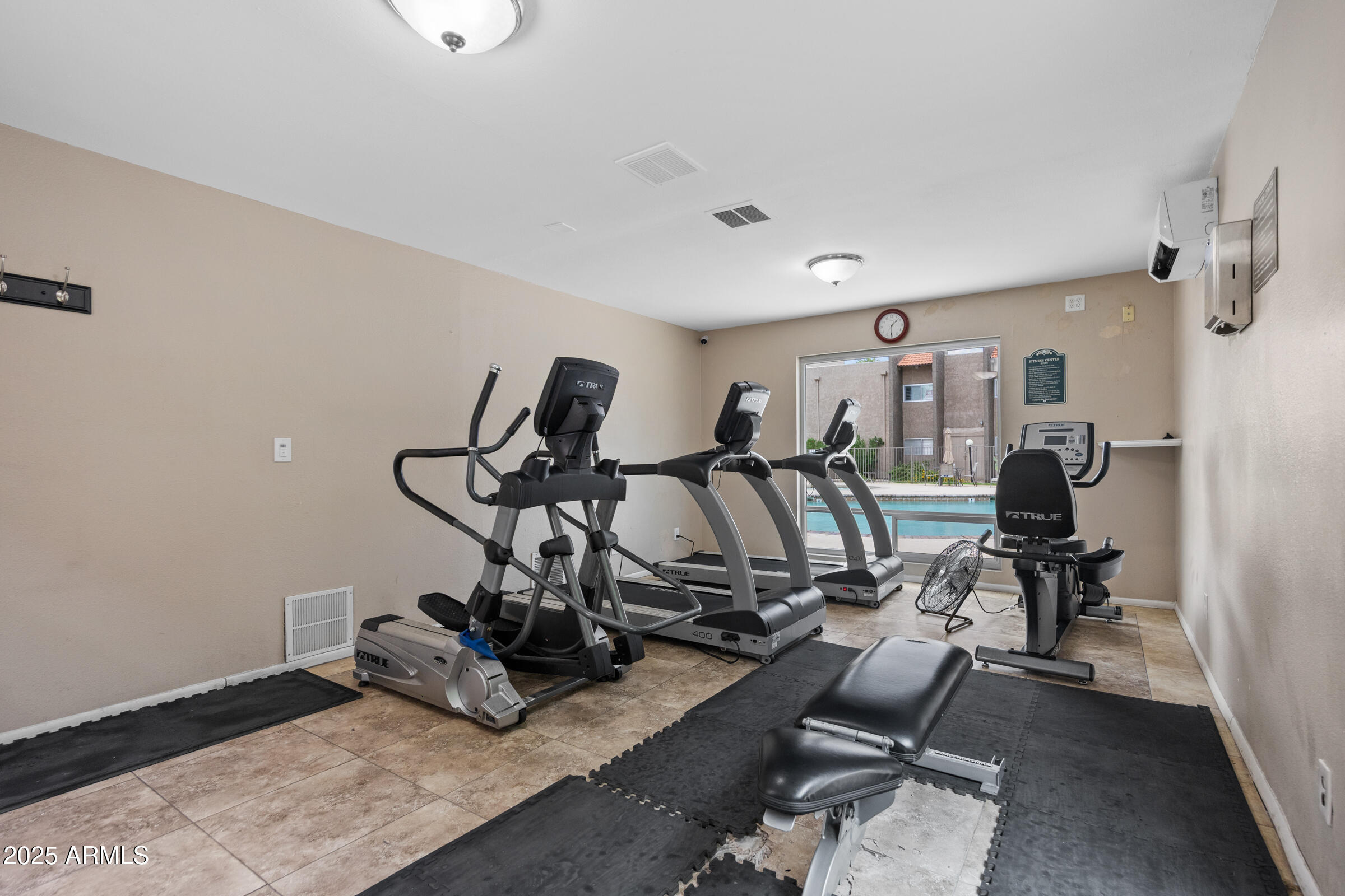 5525 East Thomas Road, Unit M11 Phoenix, AZ 85018 - Photo 28 of 39 a view of a room with gym equipment