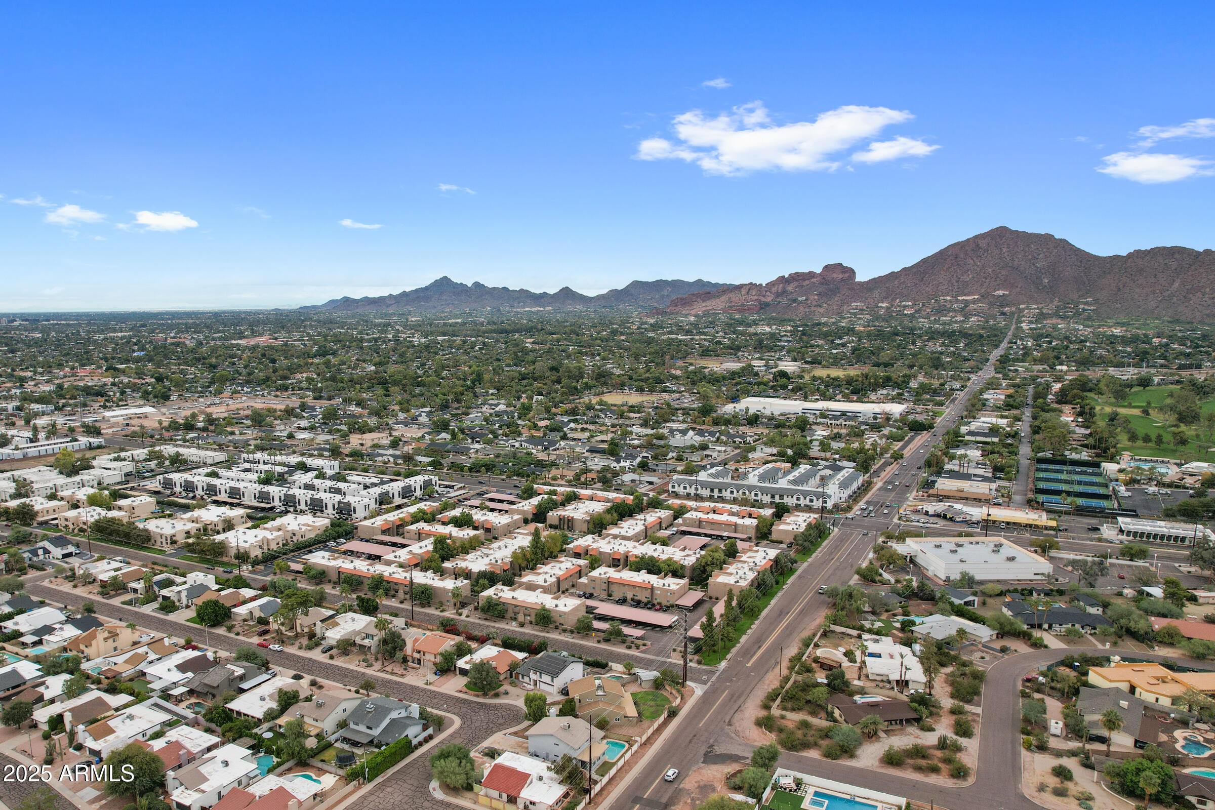 5525 East Thomas Road, Unit M11 Phoenix, AZ 85018 - Photo 31 of 39 an aerial view of residential houses with outdoor space
