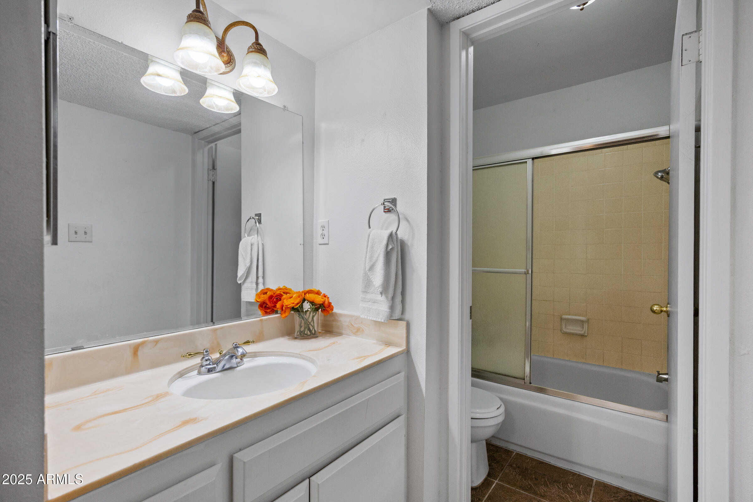5525 East Thomas Road, Unit M11 Phoenix, AZ 85018 - Photo 8 of 39 a bathroom with a sink a toilet and shower