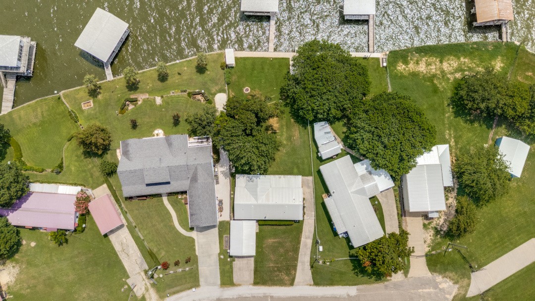 207 Vivian Road Onalaska, TX 77360 - Photo 30 of 34 an aerial view of residential house with outdoor space and swimming pool