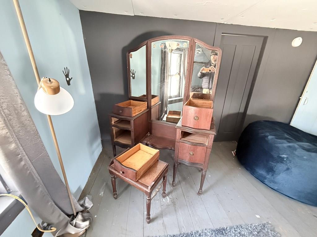 111 High Street Cooperstown, PA 16317 - Photo 19 of 46 a living room with furniture and a window