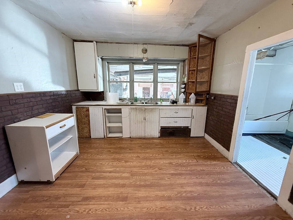 111 High Street Cooperstown, PA 16317 - Photo 3 of 46 a large kitchen with stainless steel appliances granite countertop a stove a sink dishwasher and a refrigerator