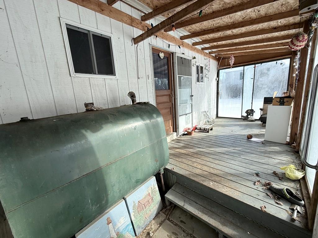 111 High Street Cooperstown, PA 16317 - Photo 34 of 46 a bedroom with a bed and a mirror