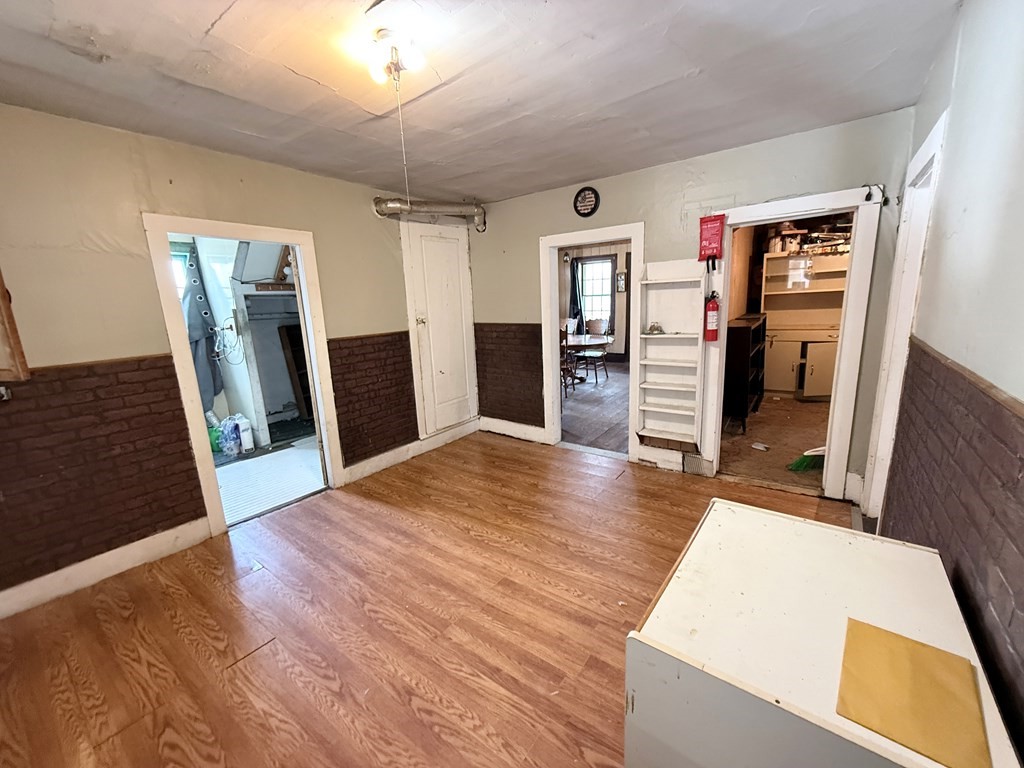 111 High Street Cooperstown, PA 16317 - Photo 4 of 46 a bedroom with a bed and wooden floor