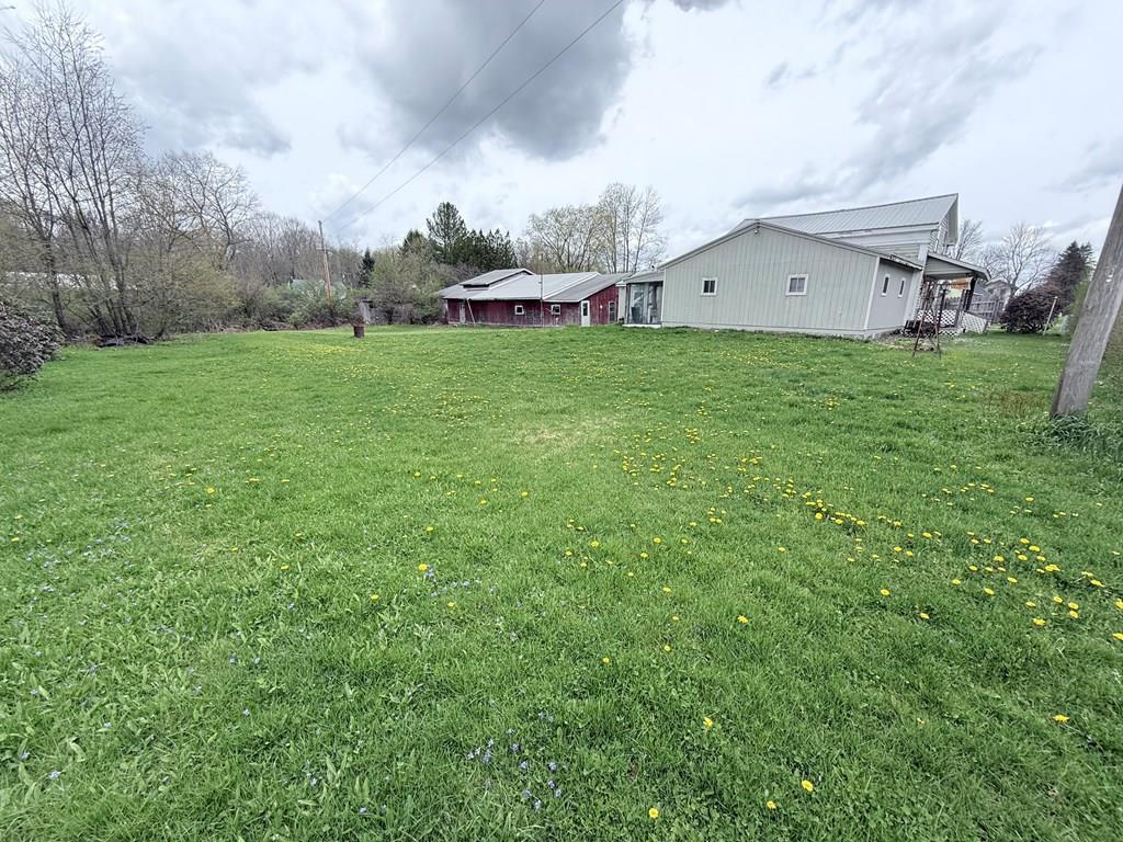 111 High Street Cooperstown, PA 16317 - Photo 42 of 46 a view of a house with a yard