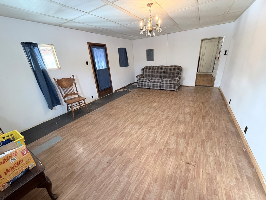 111 High Street Cooperstown, PA 16317 - Photo 6 of 46 a view of an empty room and wooden floor