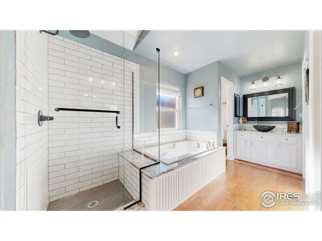 a bathroom with a sink a washer and dryer