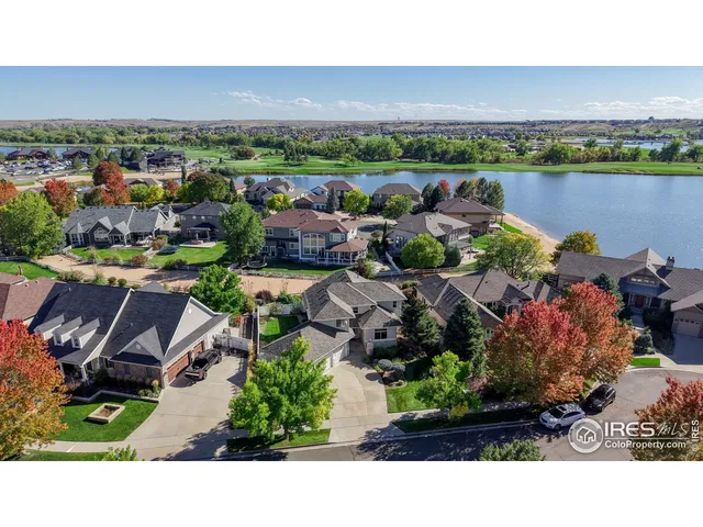 a view of a city with a lake