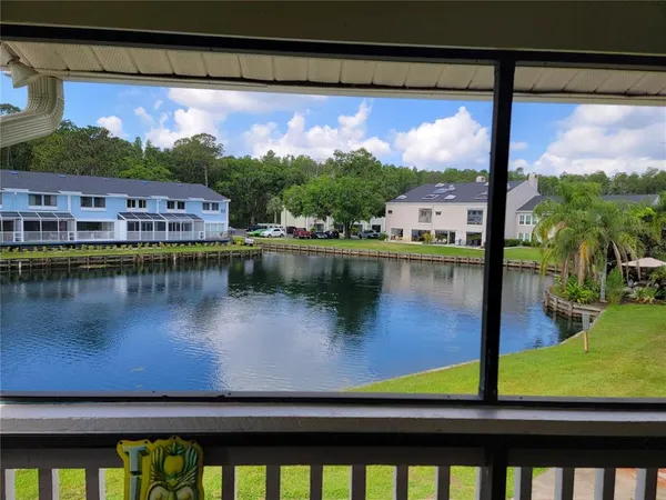 a view of swimming pool from a balcony