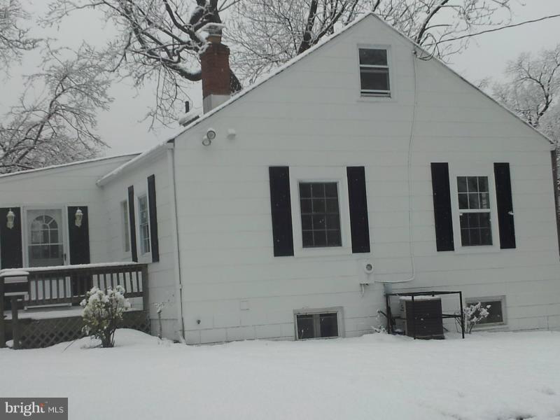 11509 Joseph Mill Road Silver Spring, MD 20906 - Photo 1 of 24 a view of a house with roof and wooden fence