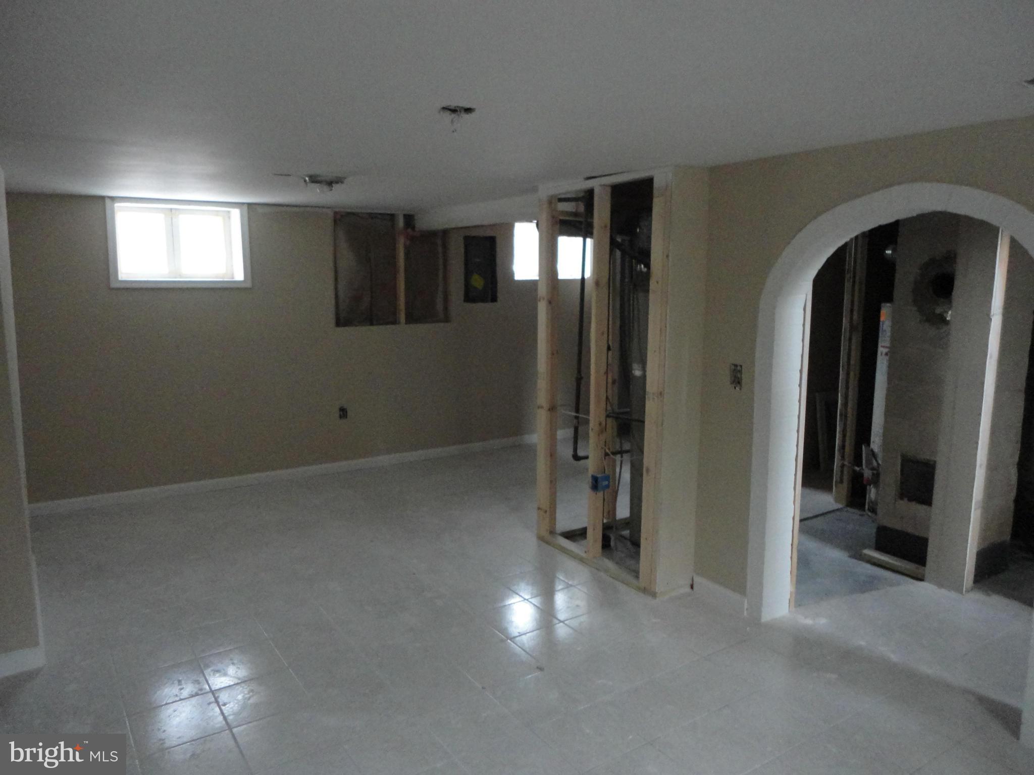11509 Joseph Mill Road Silver Spring, MD 20906 - Photo 7 of 24 a view of a livingroom with a staircase