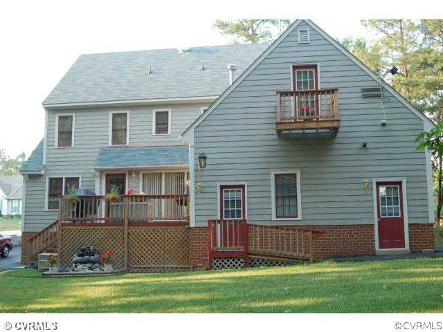 11901 Taplow Road Midlothian, VA 23112 - Photo 3 of 7 a front view of a house with a yard