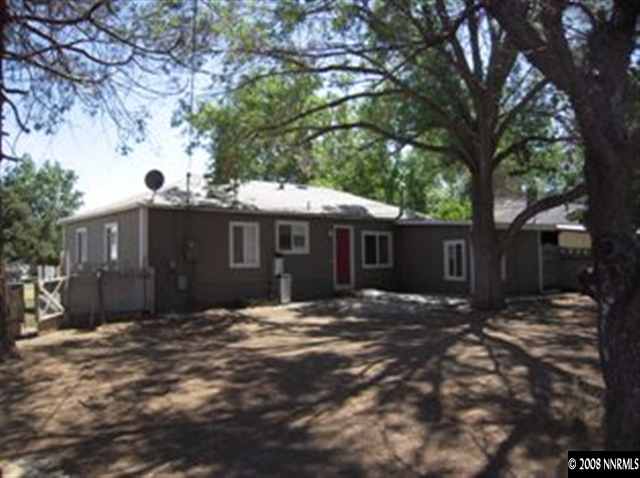 595 Apple Street Reno, NV 89502 - Photo 2 of 9 a front view of a house with a yard