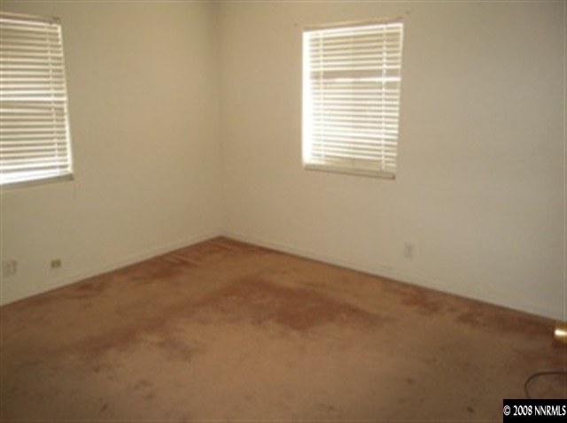 595 Apple Street Reno, NV 89502 - Photo 5 of 9 an empty room with a window