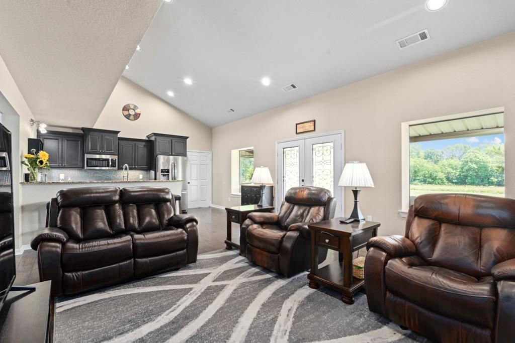 455 County Road 2808 Mabank, TX 75147 - Photo 13 of 40 a living room with furniture kitchen and a window