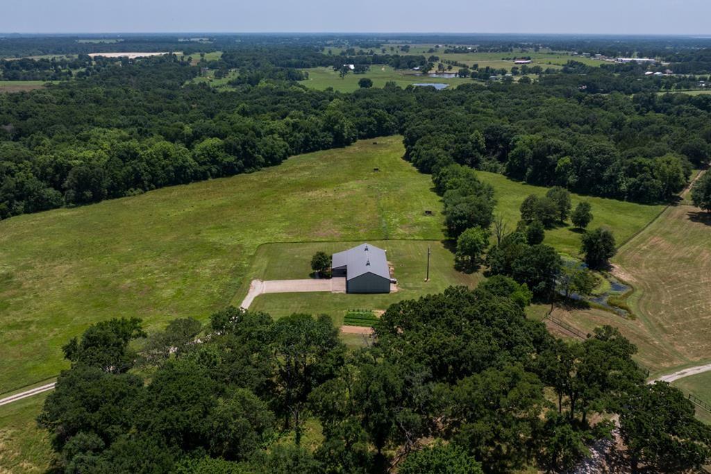 455 County Road 2808 Mabank, TX 75147 - Photo 34 of 40 an aerial view of a house with a yard