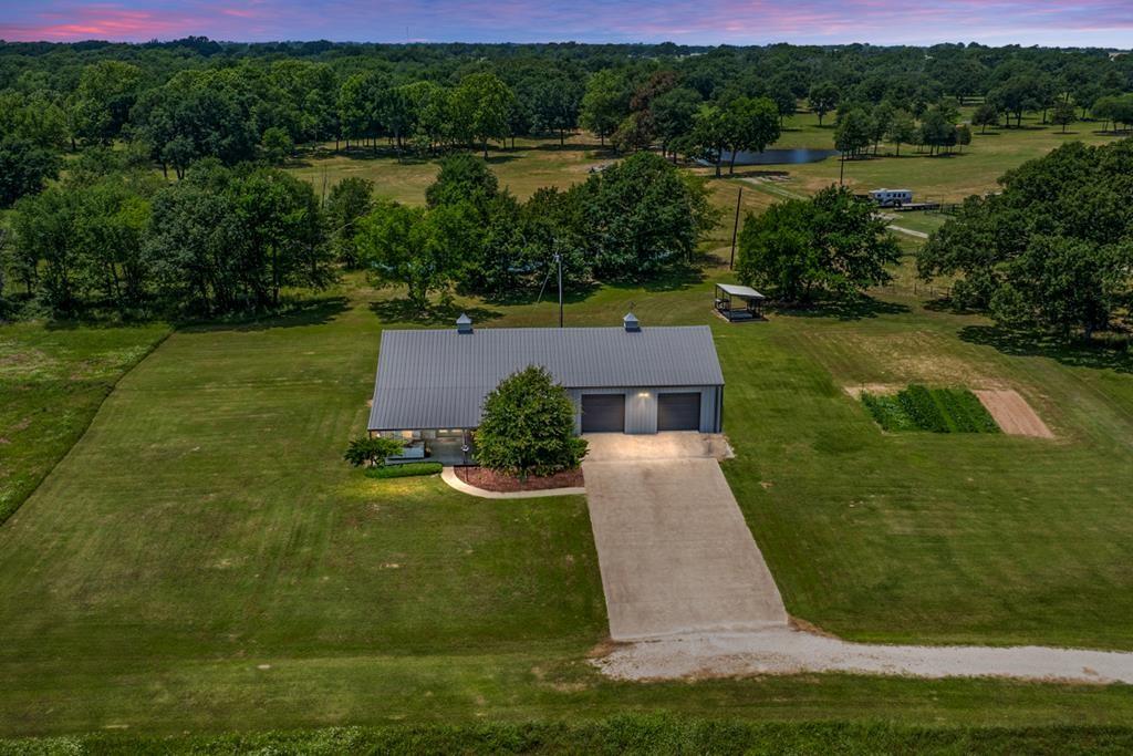 455 County Road 2808 Mabank, TX 75147 - Photo 38 of 40 a view of a lake with a yard