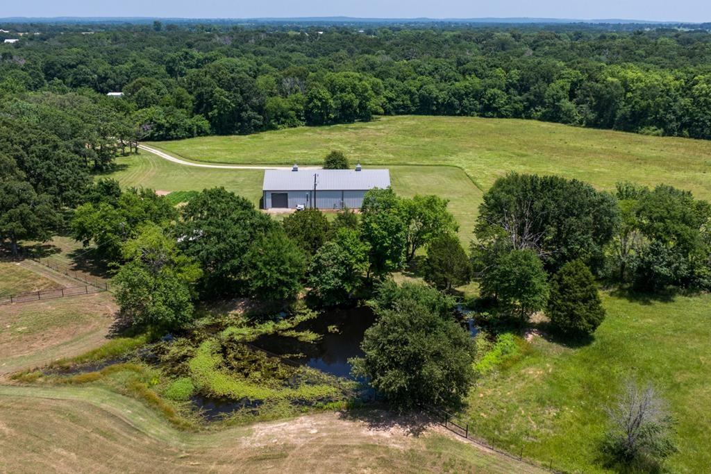 455 County Road 2808 Mabank, TX 75147 - Photo 5 of 40 a view of a big yard with large trees