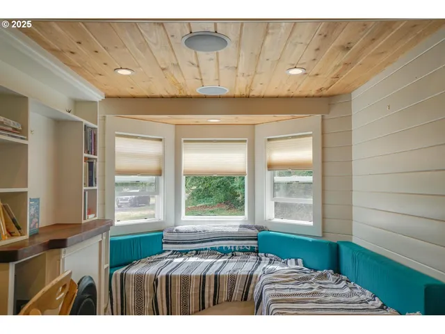 a view of an empty room and window