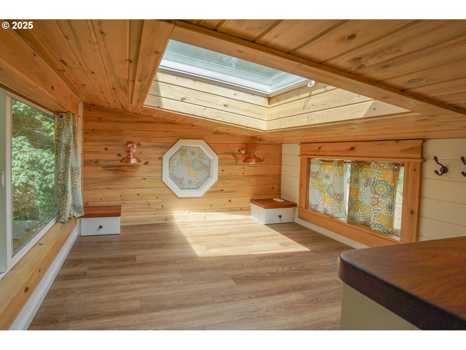 1922 Duncan Creek Road Stevenson, WA 98648 - Photo 23 of 39 a view of a room with wooden floor and windows