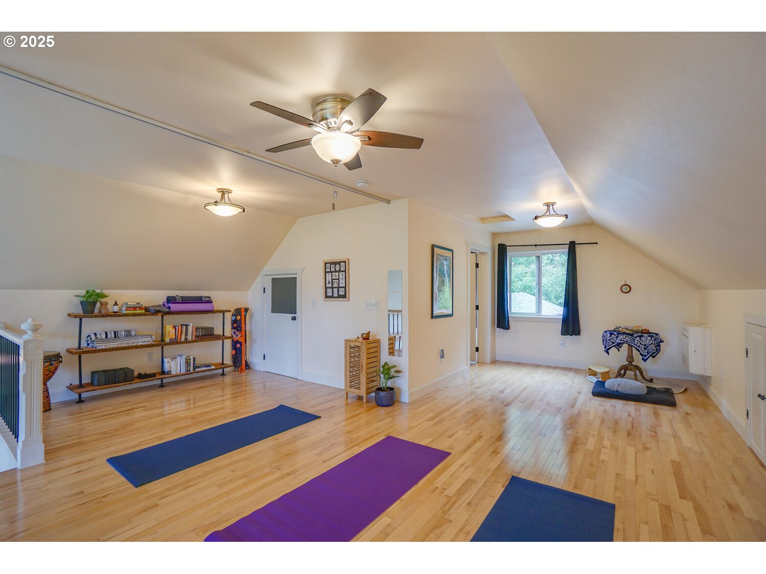 1922 Duncan Creek Road Stevenson, WA 98648 - Photo 33 of 39 a living room with furniture and a wooden floor