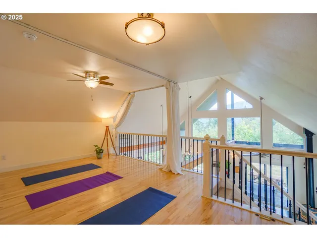 a view of a living room and a floor to ceiling window