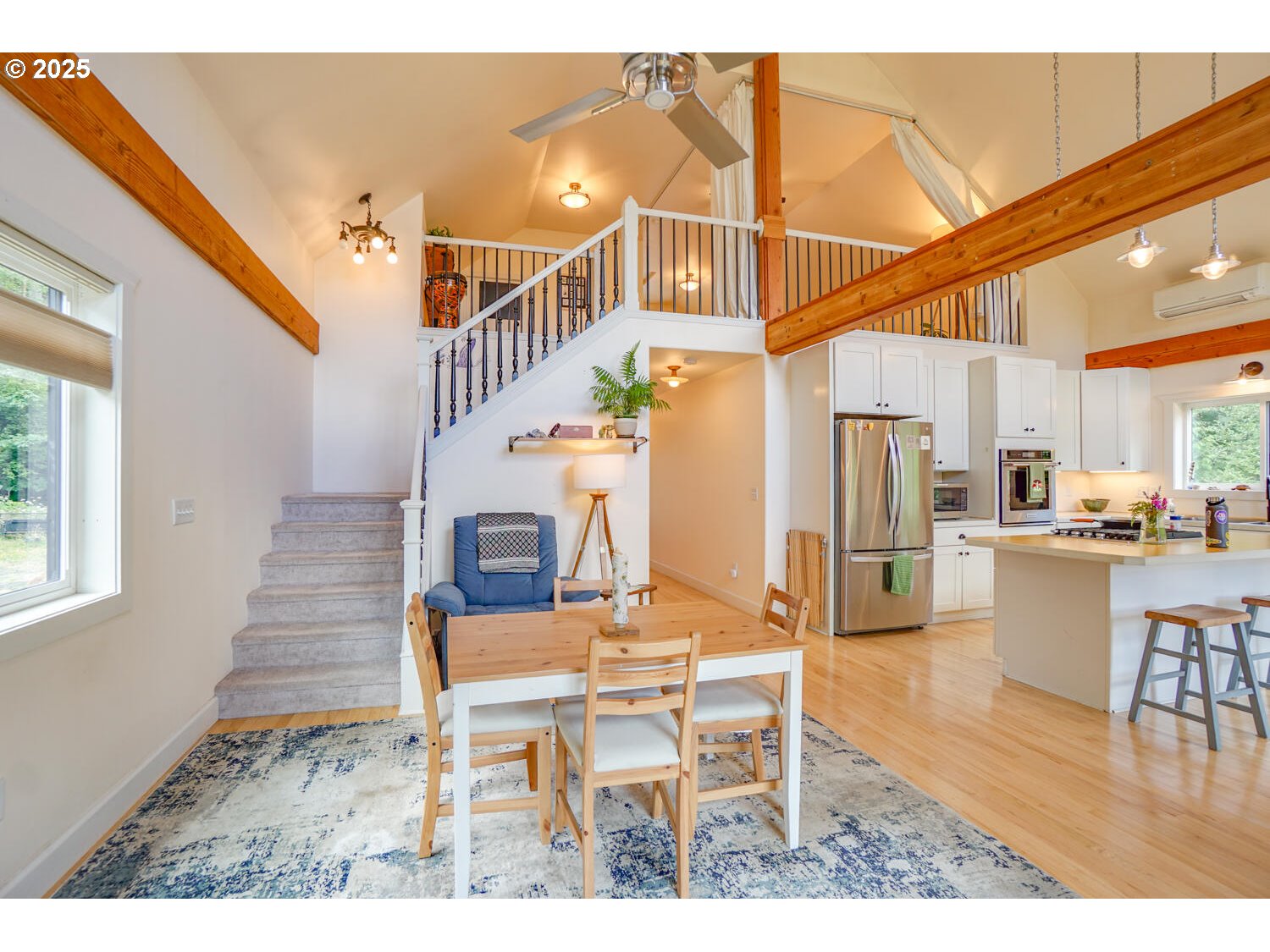1922 Duncan Creek Road Stevenson, WA 98648 - Photo 5 of 39 a dining room with furniture and wooden floor