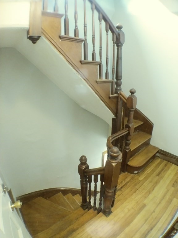74 Sydney Street, Unit 2 Boston, MA 02125 - Photo 10 of 28 a view of entryway and hall with wooden floor