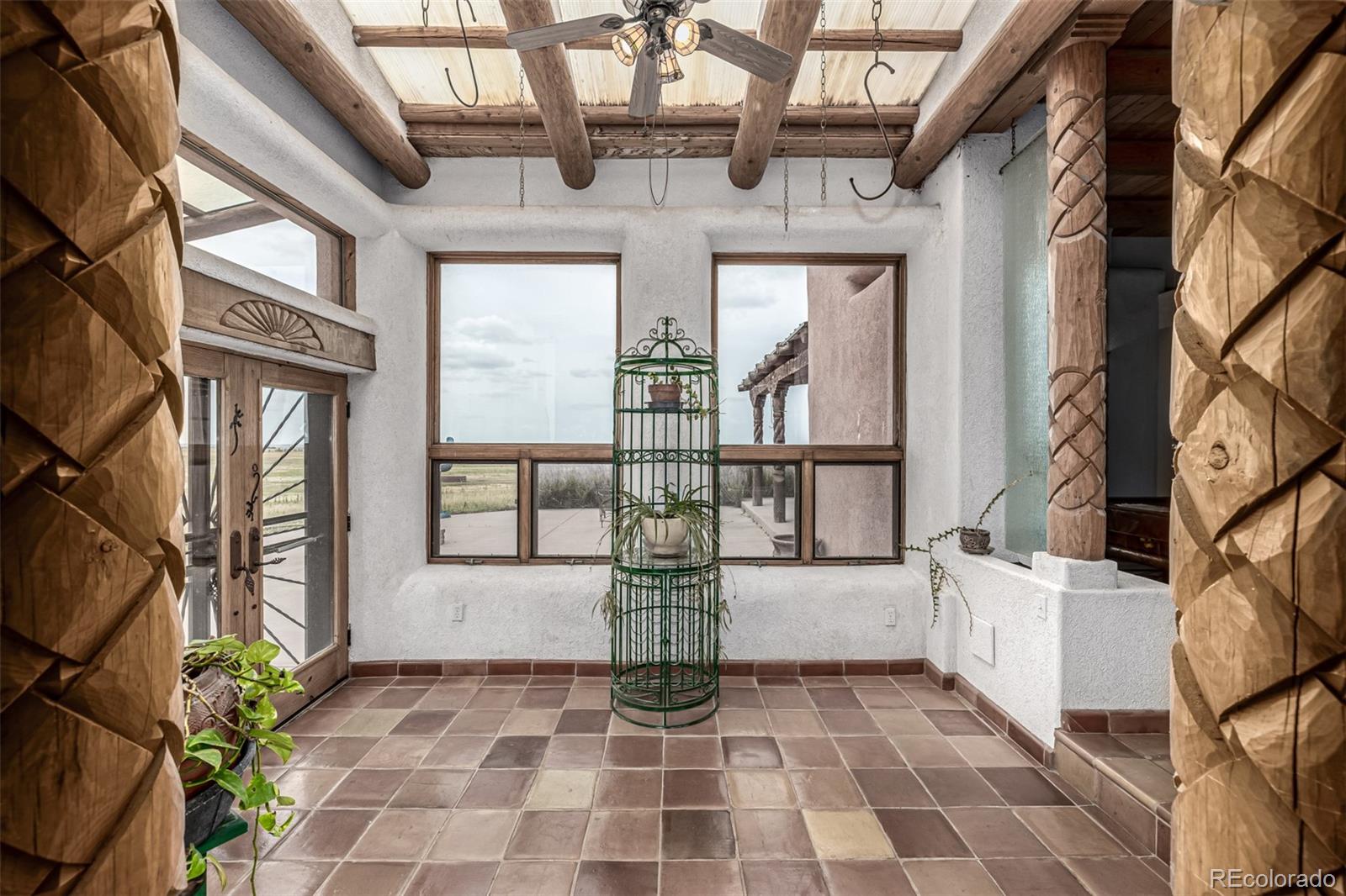 4601 County Road 161 Strasburg, CO 80136 - Photo 17 of 50 a view of a brick house with large windows