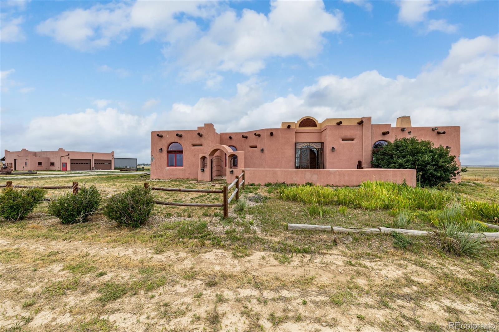 4601 County Road 161 Strasburg, CO 80136 - Photo 2 of 50 an aerial view of a house with a yard
