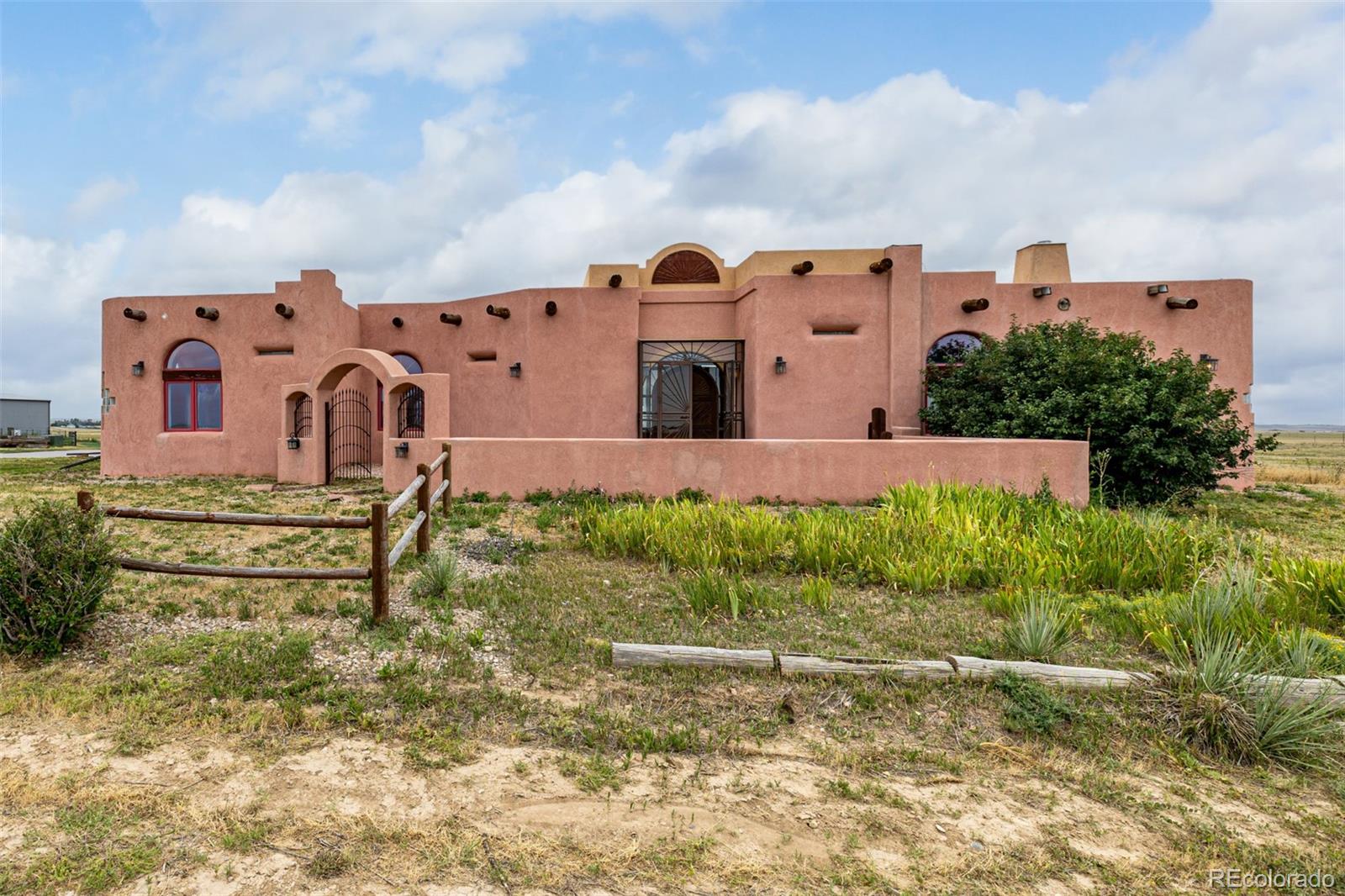 4601 County Road 161 Strasburg, CO 80136 - Photo 3 of 50 front view of a house with a yard