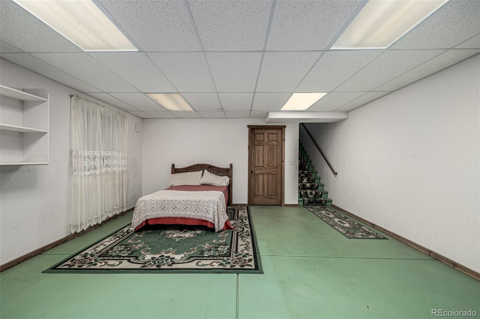 4601 County Road 161 Strasburg, CO 80136 - Photo 33 of 50 a room with hard wood floor