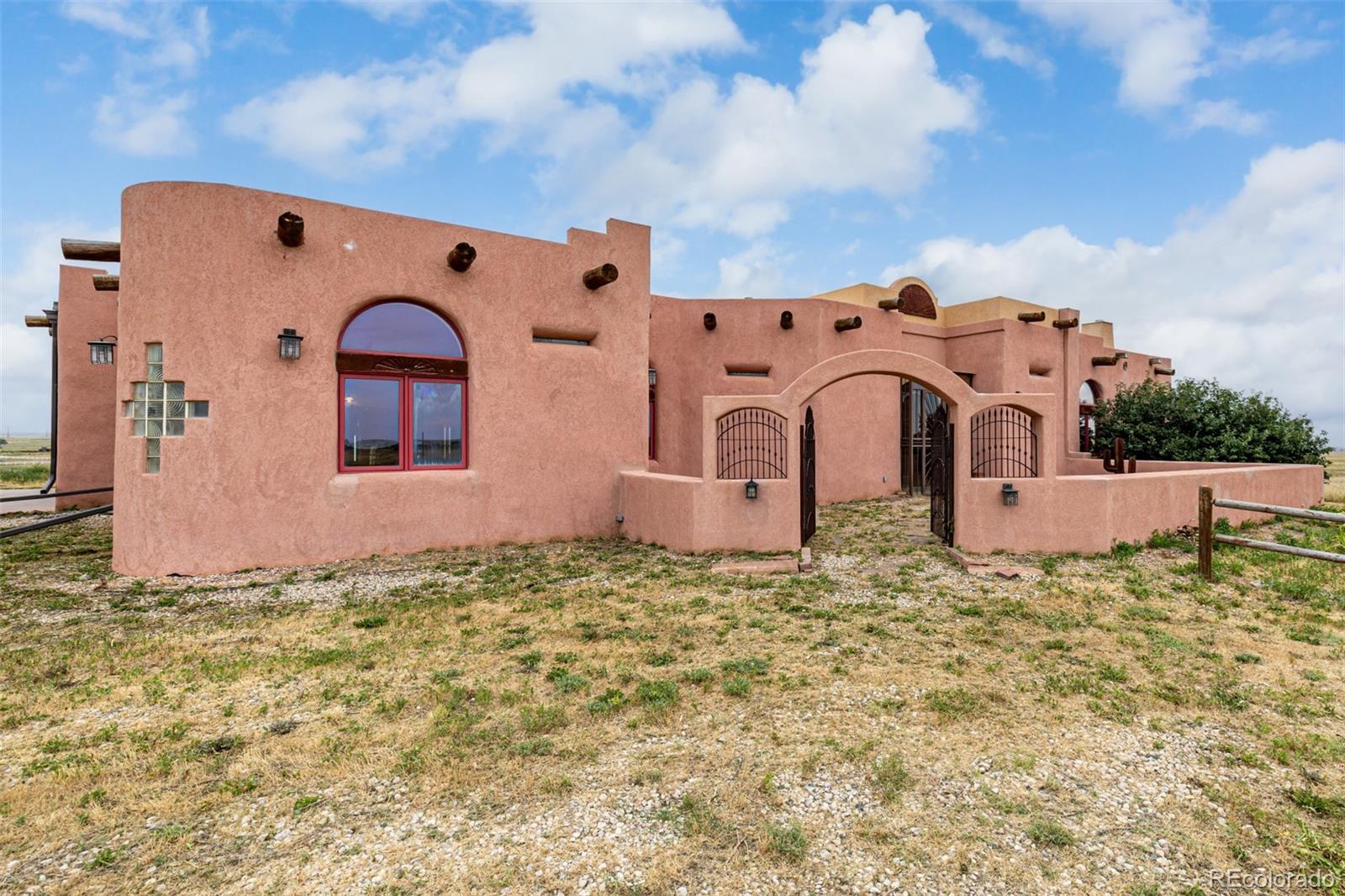 4601 County Road 161 Strasburg, CO 80136 - Photo 4 of 50 a front view of a house with a yard