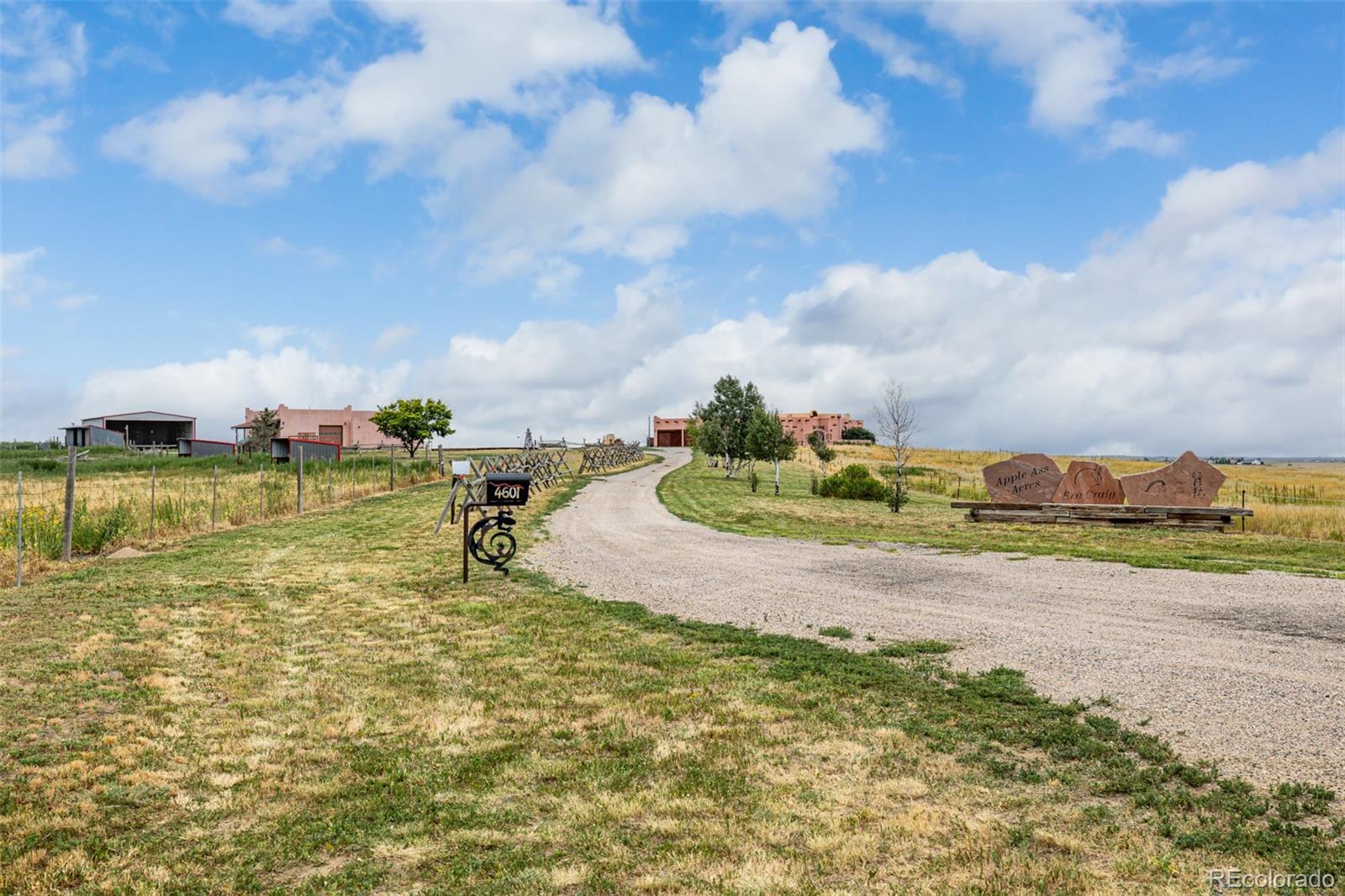 4601 County Road 161 Strasburg, CO 80136 - Photo 50 of 50 a view of a lake with houses in back