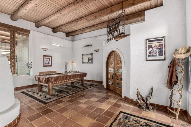 a bathroom with a sink and a large mirror