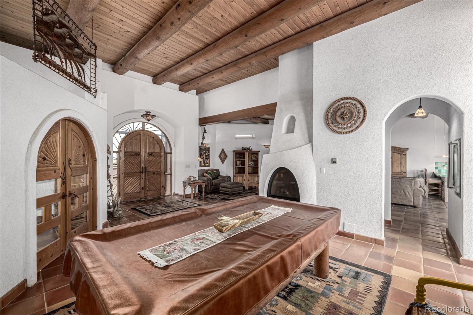 4601 County Road 161 Strasburg, CO 80136 - Photo 10 of 50 a living room with a rug