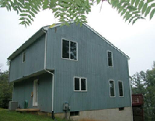 1344 Hickory Falls Road Blue Ridge, VA 24064 - Photo 4 of 5 a front view of a house with garden