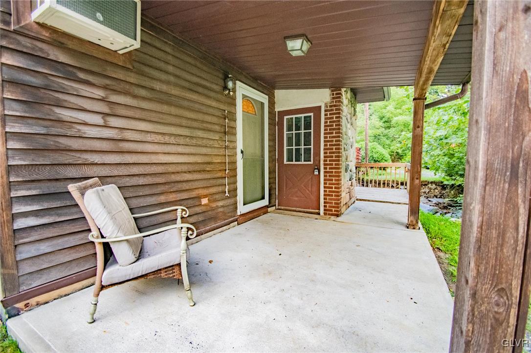 2516 Scout House Road Slatington, PA 18080 - Photo 20 of 22 a view of a patio with a table and chairs