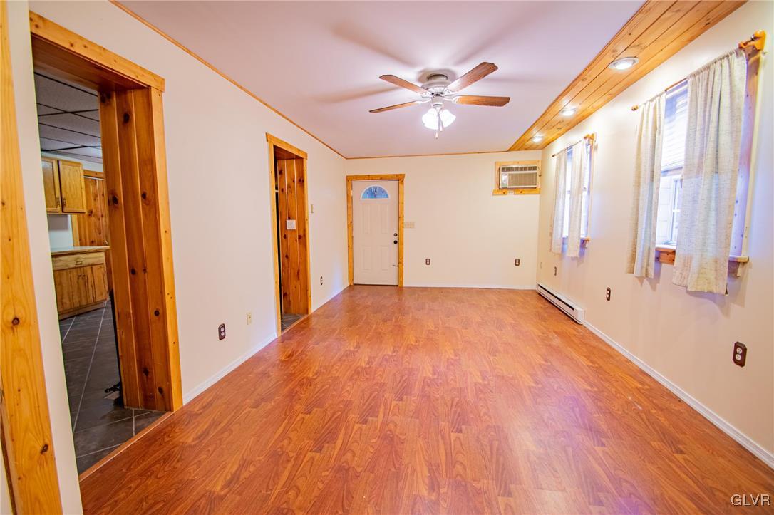 2516 Scout House Road Slatington, PA 18080 - Photo 5 of 22 wooden floor in an empty room with a window