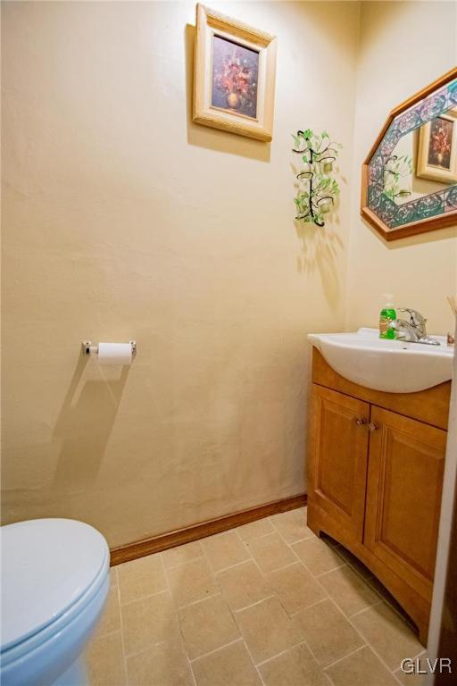 2516 Scout House Road Slatington, PA 18080 - Photo 8 of 22 a bathroom with a sink mirror vanity and toilet