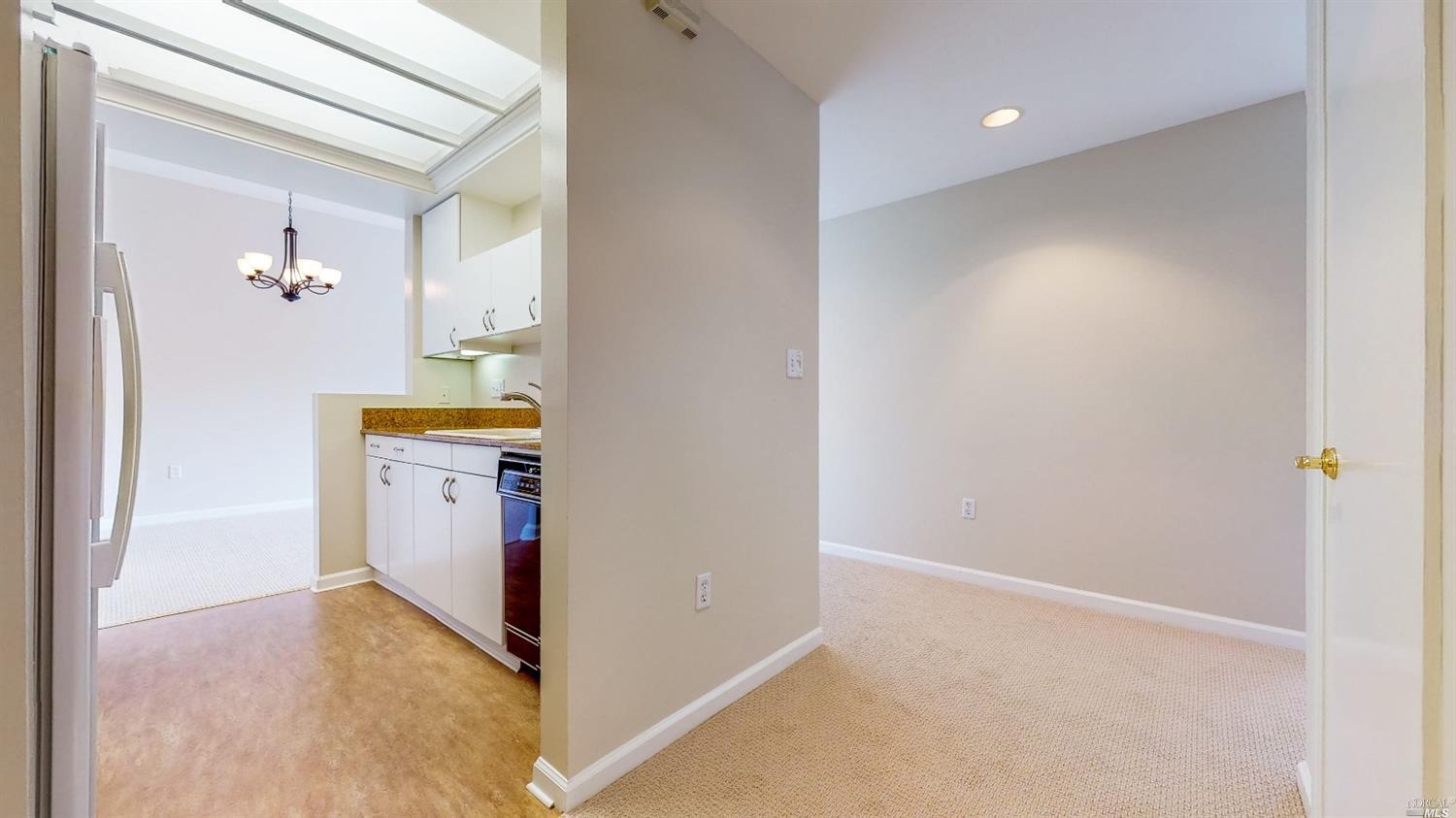 400 Deer Valley Road, Unit 5E San Rafael, CA 94903 - Photo 1 of 1 Entry Foyer to Kitchen