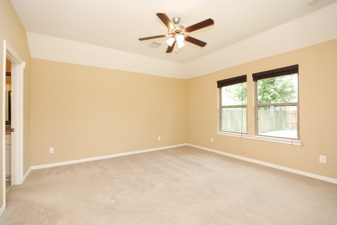 6615 Goldspier Street Houston, TX 77091 - Photo 18 of 37 HUGE primary retreat with vaulted ceiling. Photos don't give justice to the size of this room..