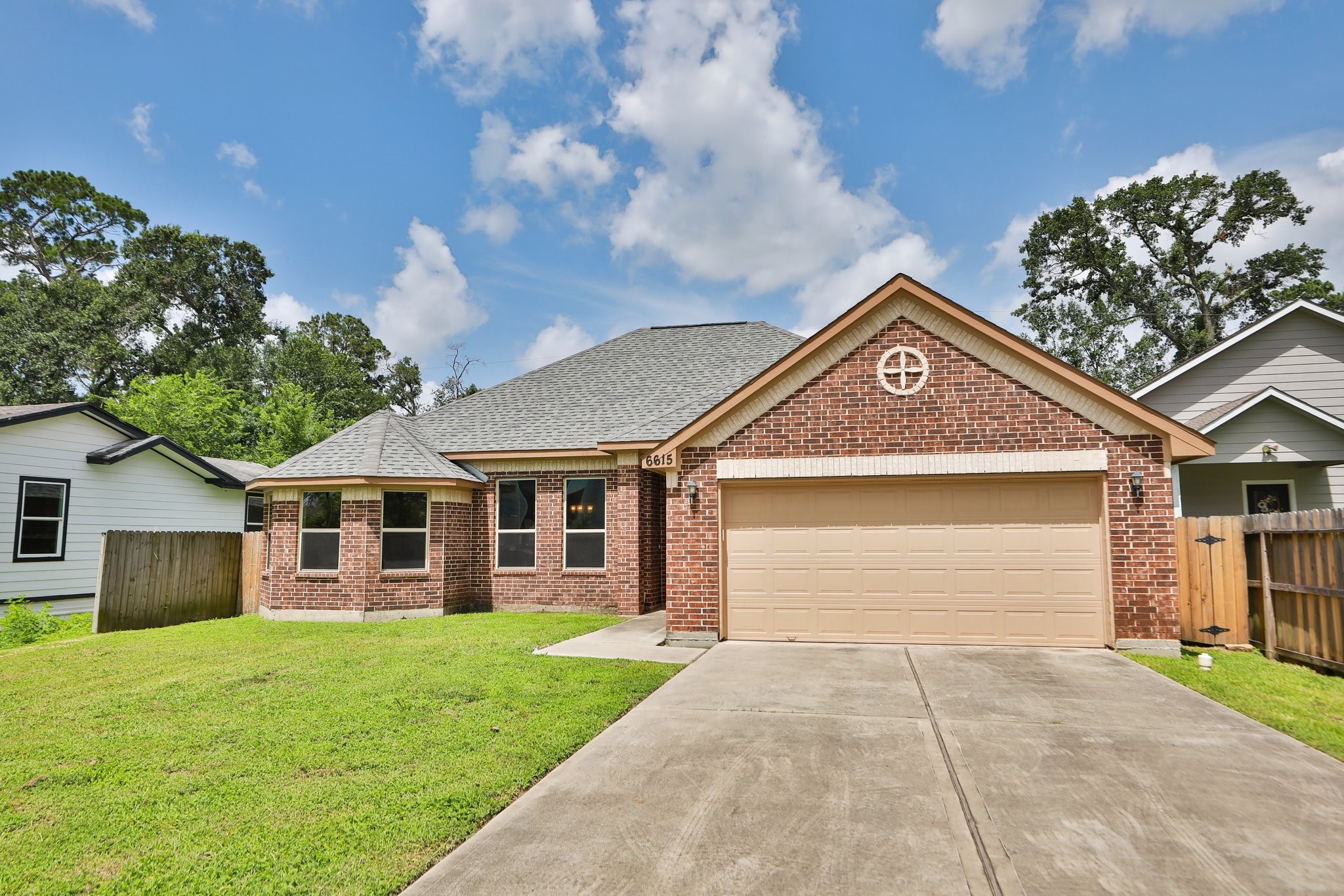 6615 Goldspier Street Houston, TX 77091 - Photo 2 of 37 Nice long driveway and big two car garage.
